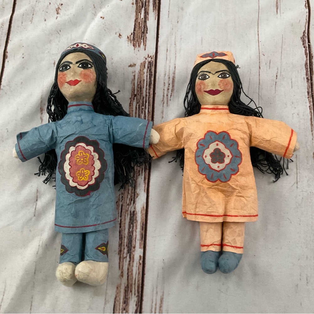 TWO VINTAGE HANDMADE PAPER MACHE AND STRING DOLLS